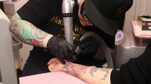 A photo of Madi Rawson doing laser tattoo removal in Edmonton, Alberta