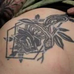 A photo of the tattoo on the ribs where we are targeting just the geometric lines, before any treatments.