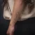 A photo of a Fine Line 2 years old tattoo on the forearm on a person with FitzPatrick Skin Type iv type 1. This client is hoping for Cover Up Tattoo