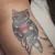 A photo of a Traditional tattoo on the shin on a person with FitzPatrick Skin Type iv type 1. This client is hoping for Cover Up Tattoo