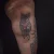 A photo of a Traditional tattoo on the shin on a person with FitzPatrick Skin Type iv type 1 3 Months after their  treatment. This client is hoping for Cover Up Tattoo