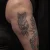 A photo of a Traditional tattoo on the shin on a person with FitzPatrick Skin Type iv type 1 19 Months after their  treatment. This client is hoping for Cover Up Tattoo