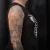A photo of a illustrative and Colour 20 Years tattoo on the arm on a person with FitzPatrick Skin Type ii 8 Months after their 3 treatment. This client is hoping for Cover Up Tattoo