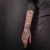 A photo of a 3 Months old tattoo on the wrist on a person with FitzPatrick Skin Type ii. This client is hoping for Cover Up Tattoo