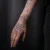A photo of a 3 Months old tattoo on the wrist on a person with FitzPatrick Skin Type ii 14 Months after their treatment. This client is hoping for Cover Up Tattoo