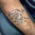 A photo of a Blackwork 41 Years old tattoo on the forearm on a person with FitzPatrick Skin Type iii. This client is hoping for Complete Removal