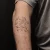 A photo of a Linework 41 Years tattoo on the forearm on a person with FitzPatrick Skin Type iii 11 Weeks after their  treatment. This client is hoping for Complete Removal