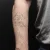 A photo of a Linework 41 Years tattoo on the forearm on a person with FitzPatrick Skin Type iii 12 Weeks after their  treatment. This client is hoping for Complete Removal