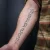 A photo of a Black & Gray and Script 17 Years old tattoo on the forearm on a person with FitzPatrick Skin Type iii. This client is hoping for Complete Removal