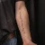 A photo of a Blackwork, illustrative and Script 17 Years old tattoo on the Belly and forearm on a person with FitzPatrick Skin Type iii and iv type 1 12 Weeks after their  treatment. This client is hoping for Complete Removal