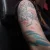 A photo of a illustrative 10 Years old tattoo on the Arm on a person with FitzPatrick Skin Type ii. This client is hoping for Cover Up Tattoo